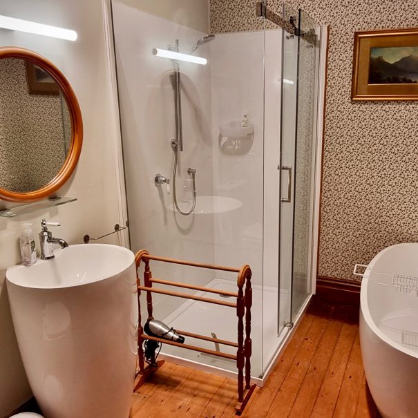 Our favourite ensuite with oils of Queenstown's Lake Wakatipu