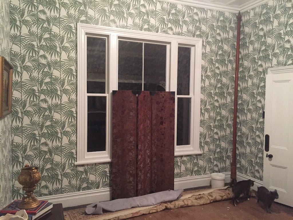 First room wallpapered with exotic feel Bold wallpapering of palm ferns
