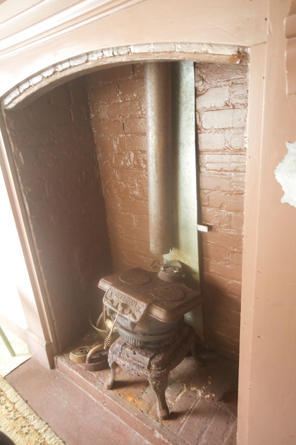 Broken pot belly waiting for a new fire insert